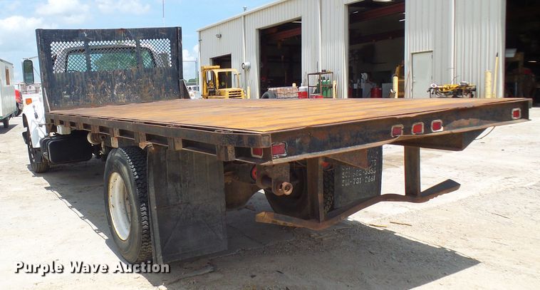 image for item DI0519 1997 Ford F700 dump flatbed truck