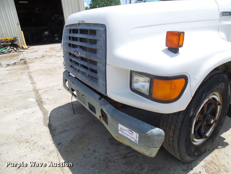 image for item DI0519 1997 Ford F700 dump flatbed truck
