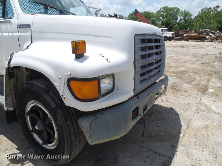 image for item DI0519 1997 Ford F700 dump flatbed truck