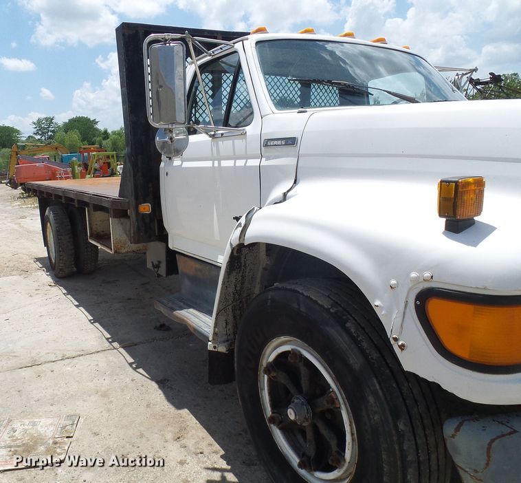 image for item DI0519 1997 Ford F700 dump flatbed truck