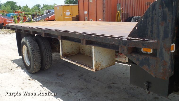 image for item DI0519 1997 Ford F700 dump flatbed truck