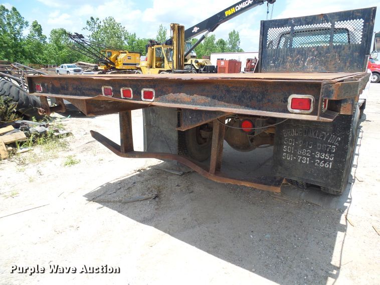 image for item DI0519 1997 Ford F700 dump flatbed truck