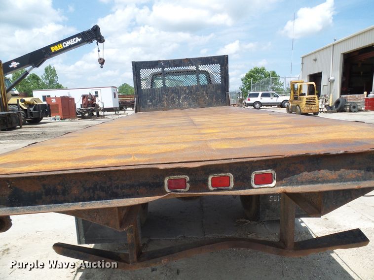 image for item DI0519 1997 Ford F700 dump flatbed truck
