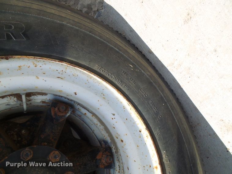 image for item DI0519 1997 Ford F700 dump flatbed truck