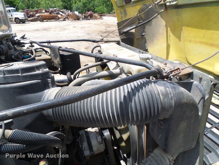 image for item DI0519 1997 Ford F700 dump flatbed truck