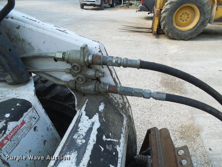 image for item DI0524 Bobcat 15C skid steer auger