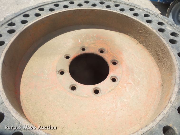 image for item FJ9152 (4) 12-16.5 solid skid steer tires and wheels