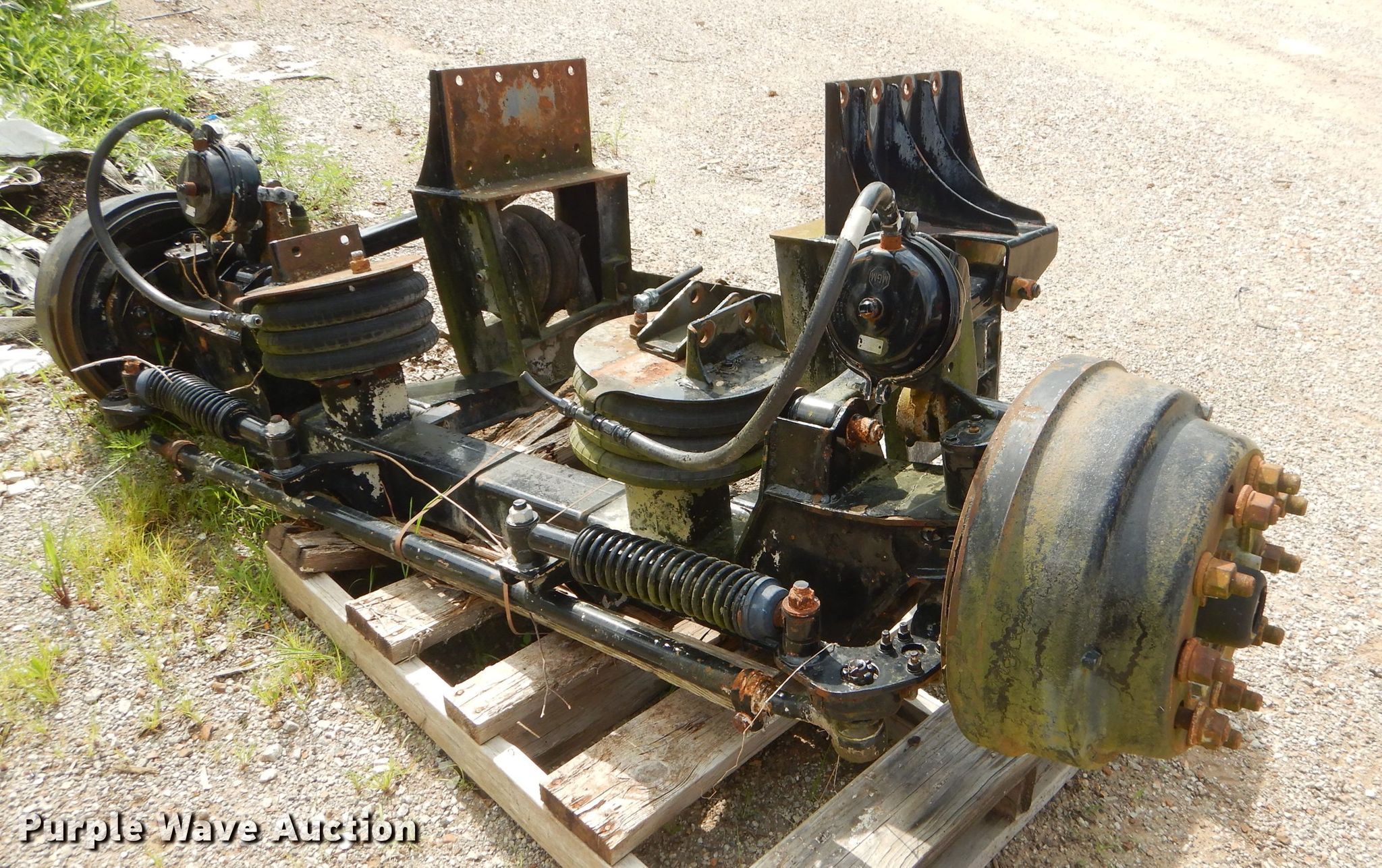 Steerable tag axle in Miami, OK Item ED9347 sold Purple Wave