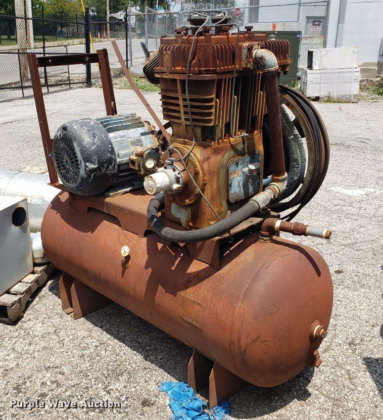 Quincy air compressor in Kansas City, MO Item EU9908 sold Purple Wave