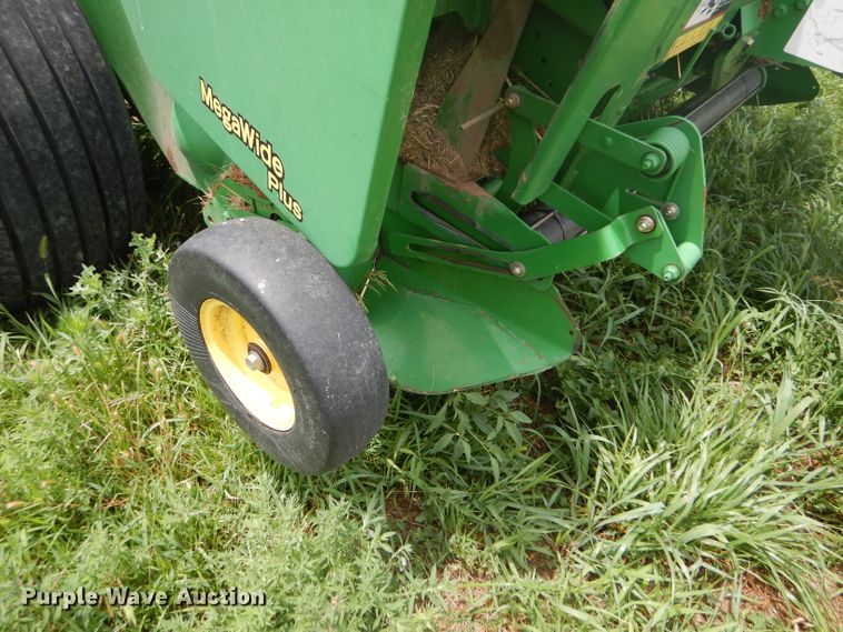 image for item GH9499 2009 John Deere 568 Mega Wide Plus round baler