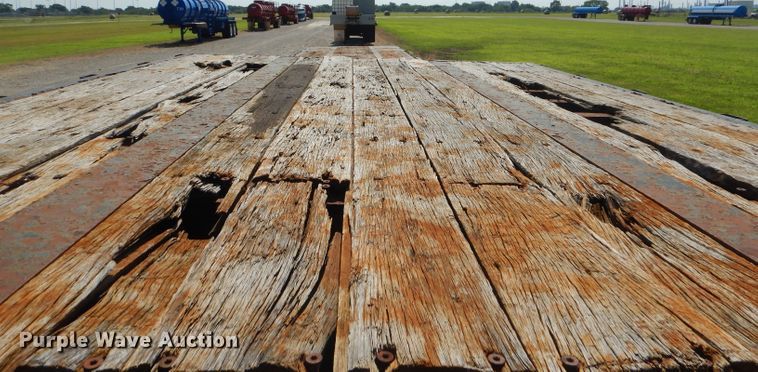 image for item ED9400 1999 Transcraft drop deck trailer