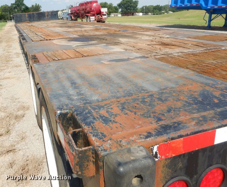 image for item ED9400 1999 Transcraft drop deck trailer