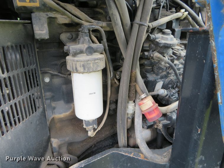 image for item DD7100 2007 New Holland TL100A tractor