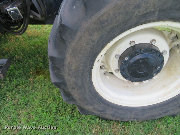 image for item DD7100 2007 New Holland TL100A tractor