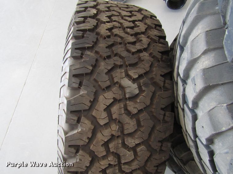 image for item DG1329 (5) 33x12.50x16.5 tires and wheels