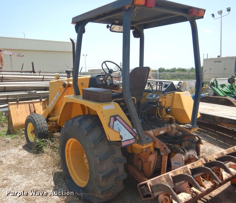 image for item FI9839 1987 John Deere 210C landscape tractor