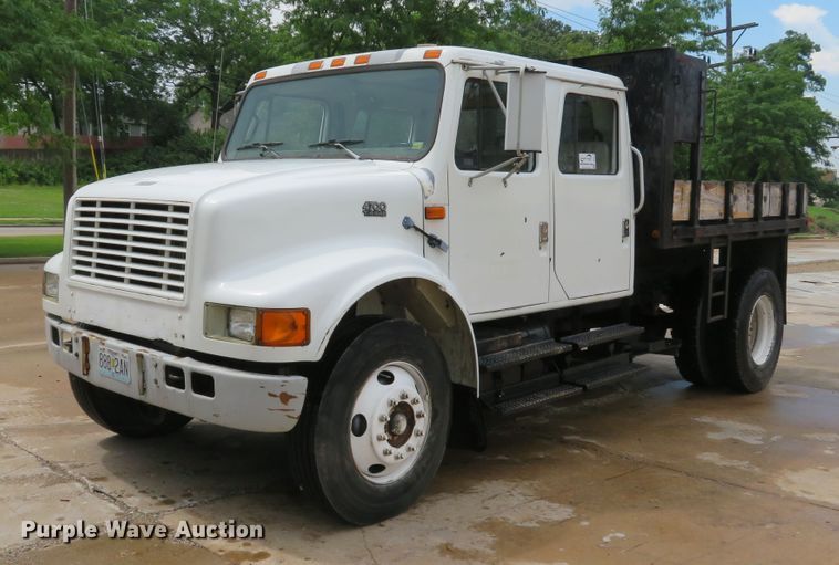 image for item DE8173 1998 International 4700 flatbed truck