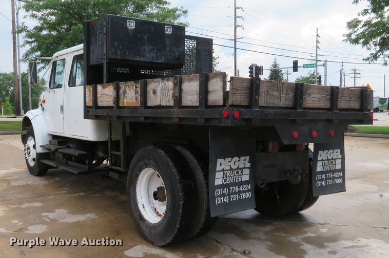 image for item DE8173 1998 International 4700 flatbed truck