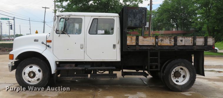 image for item DE8173 1998 International 4700 flatbed truck
