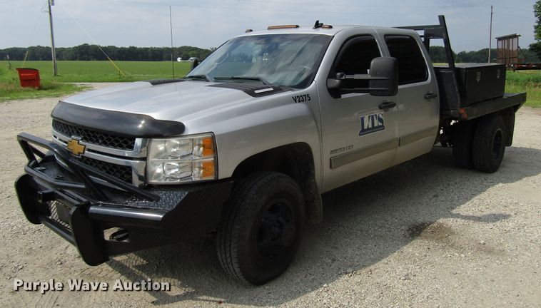 image for item DG1310 2011 Chevrolet Silverado 3500HD Crew Cab flatbed pickup truck