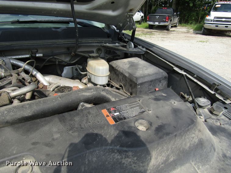 image for item DG1310 2011 Chevrolet Silverado 3500HD Crew Cab flatbed pickup truck