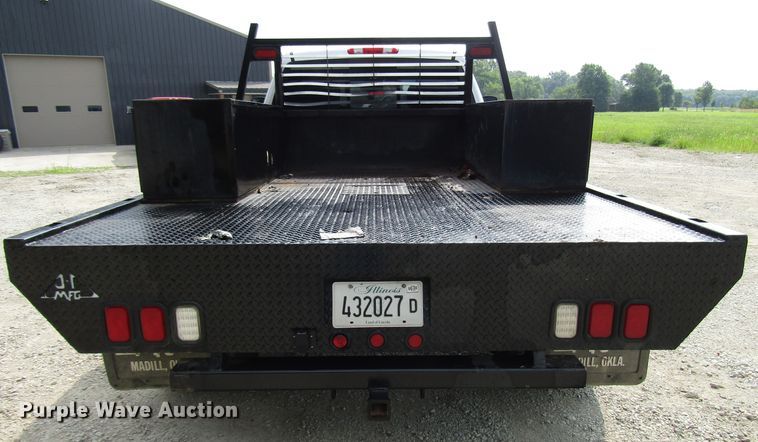image for item DG1310 2011 Chevrolet Silverado 3500HD Crew Cab flatbed pickup truck