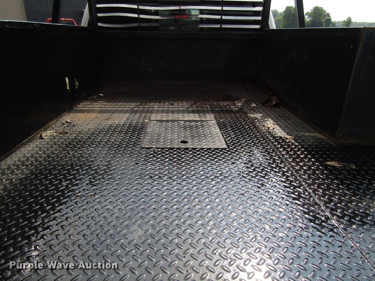 image for item DG1310 2011 Chevrolet Silverado 3500HD Crew Cab flatbed pickup truck