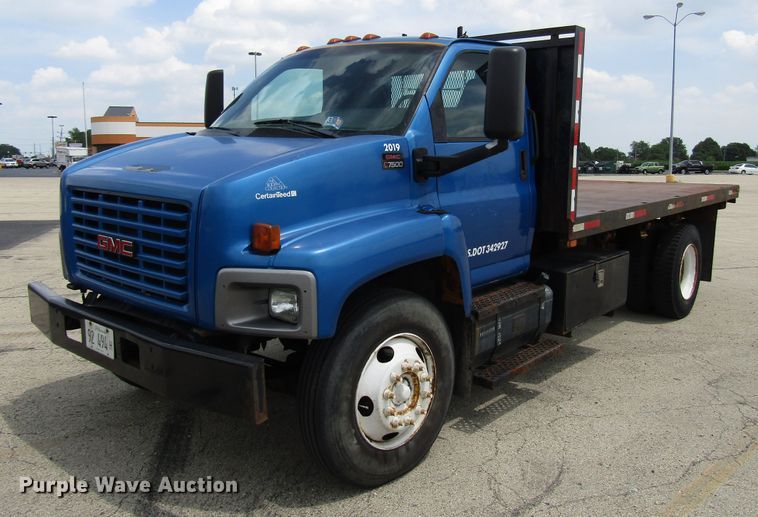 image for item DG1320 2003 GMC C7500 flat dump bed truck