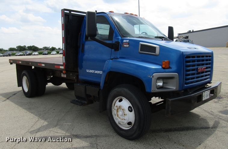 image for item DG1320 2003 GMC C7500 flat dump bed truck