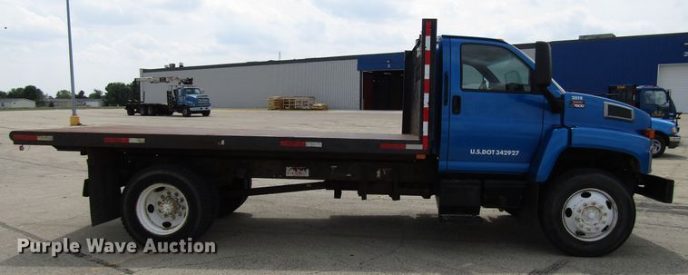 image for item DG1320 2003 GMC C7500 flat dump bed truck