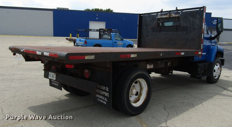 image for item DG1320 2003 GMC C7500 flat dump bed truck
