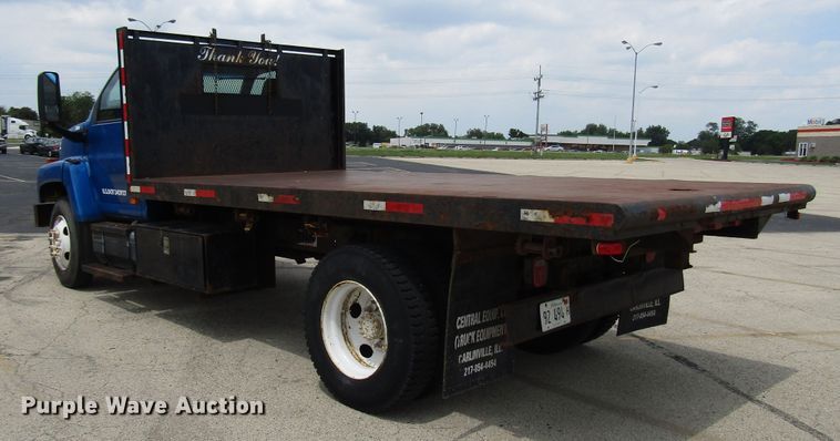 image for item DG1320 2003 GMC C7500 flat dump bed truck