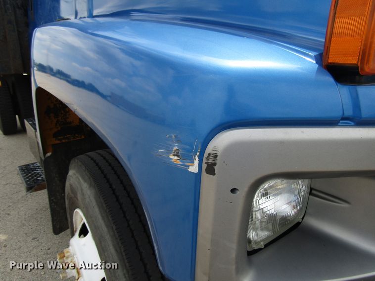 image for item DG1320 2003 GMC C7500 flat dump bed truck