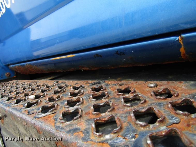 image for item DG1320 2003 GMC C7500 flat dump bed truck