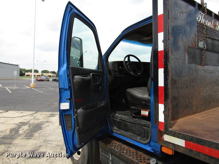 image for item DG1320 2003 GMC C7500 flat dump bed truck