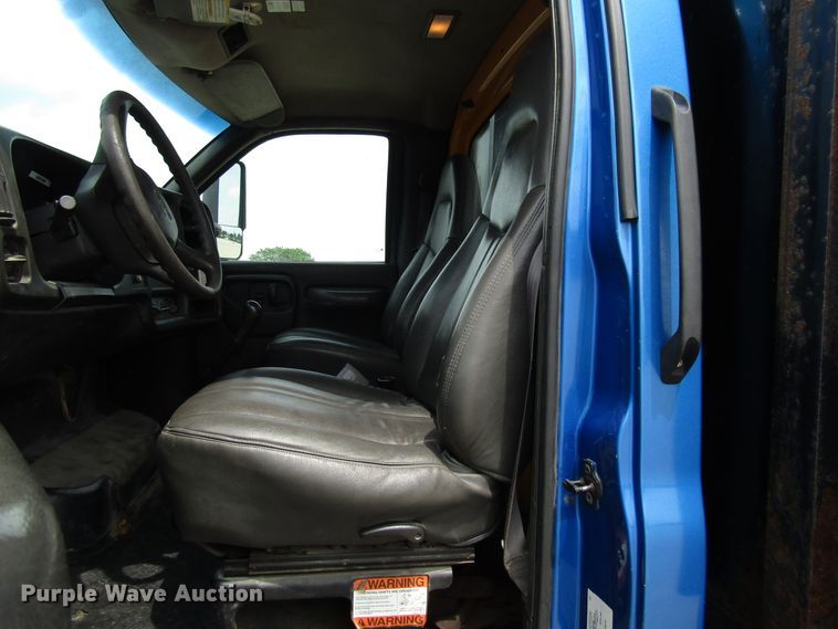 image for item DG1320 2003 GMC C7500 flat dump bed truck