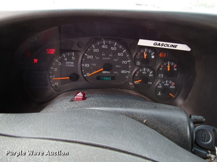 image for item DG1320 2003 GMC C7500 flat dump bed truck