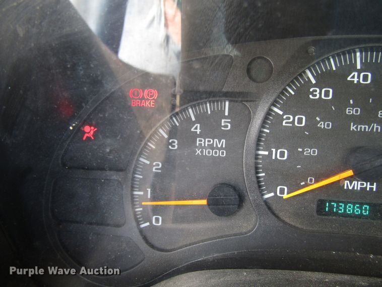 image for item DG1320 2003 GMC C7500 flat dump bed truck