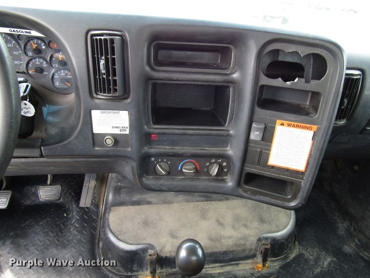 image for item DG1320 2003 GMC C7500 flat dump bed truck