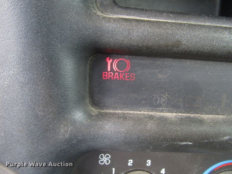 image for item DG1320 2003 GMC C7500 flat dump bed truck