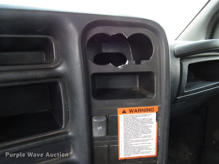 image for item DG1320 2003 GMC C7500 flat dump bed truck