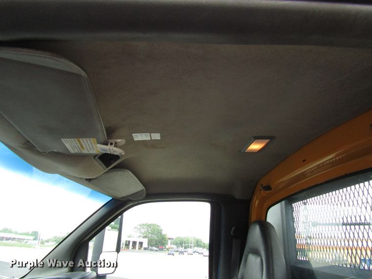 image for item DG1320 2003 GMC C7500 flat dump bed truck