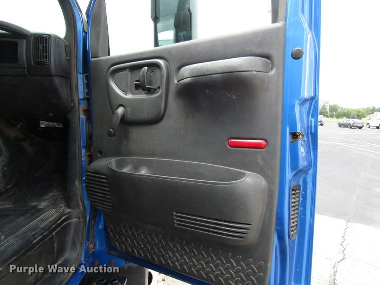 image for item DG1320 2003 GMC C7500 flat dump bed truck