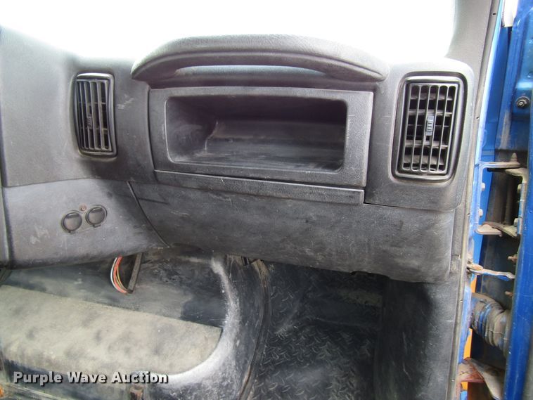 image for item DG1320 2003 GMC C7500 flat dump bed truck