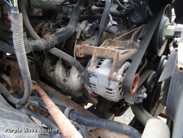 image for item DG1320 2003 GMC C7500 flat dump bed truck