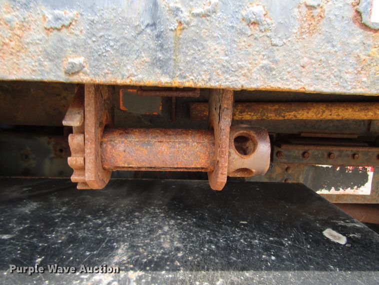 image for item DG1320 2003 GMC C7500 flat dump bed truck