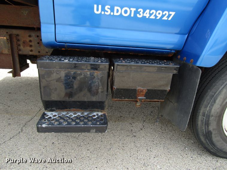 image for item DG1320 2003 GMC C7500 flat dump bed truck