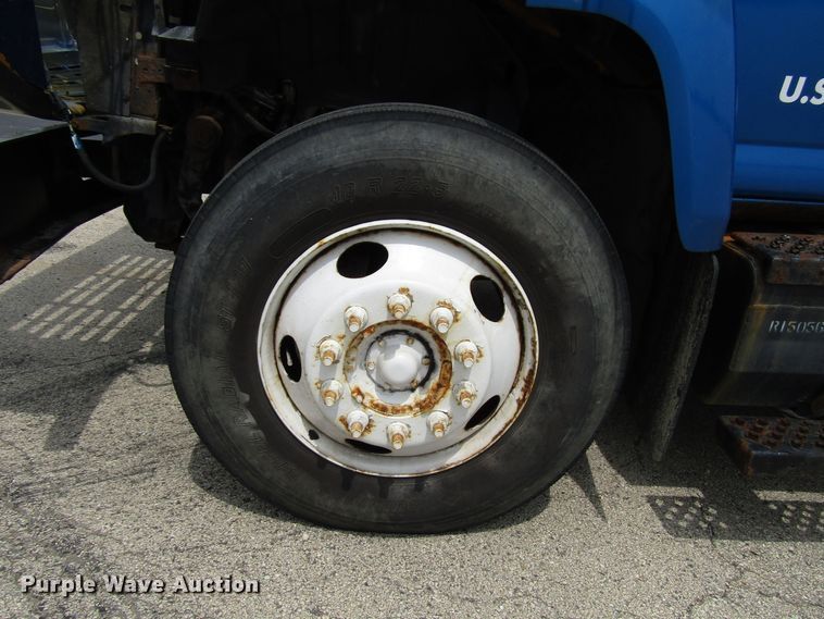 image for item DG1320 2003 GMC C7500 flat dump bed truck