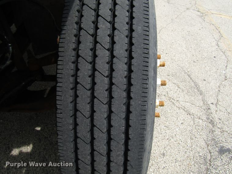 image for item DG1320 2003 GMC C7500 flat dump bed truck