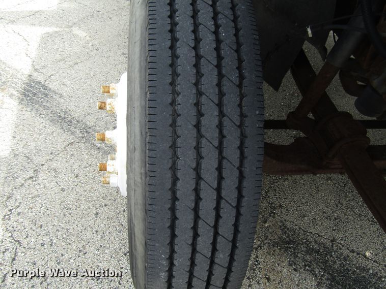 image for item DG1320 2003 GMC C7500 flat dump bed truck